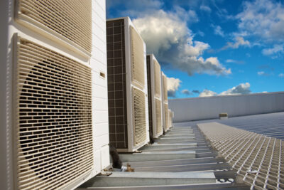 HVAC units on a metal industrial roof in the afternoon
